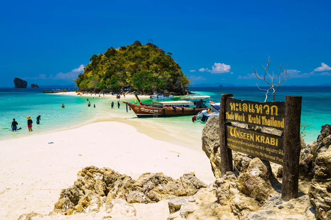 White sand and turquoise shallows at Thale Waek in Krabi