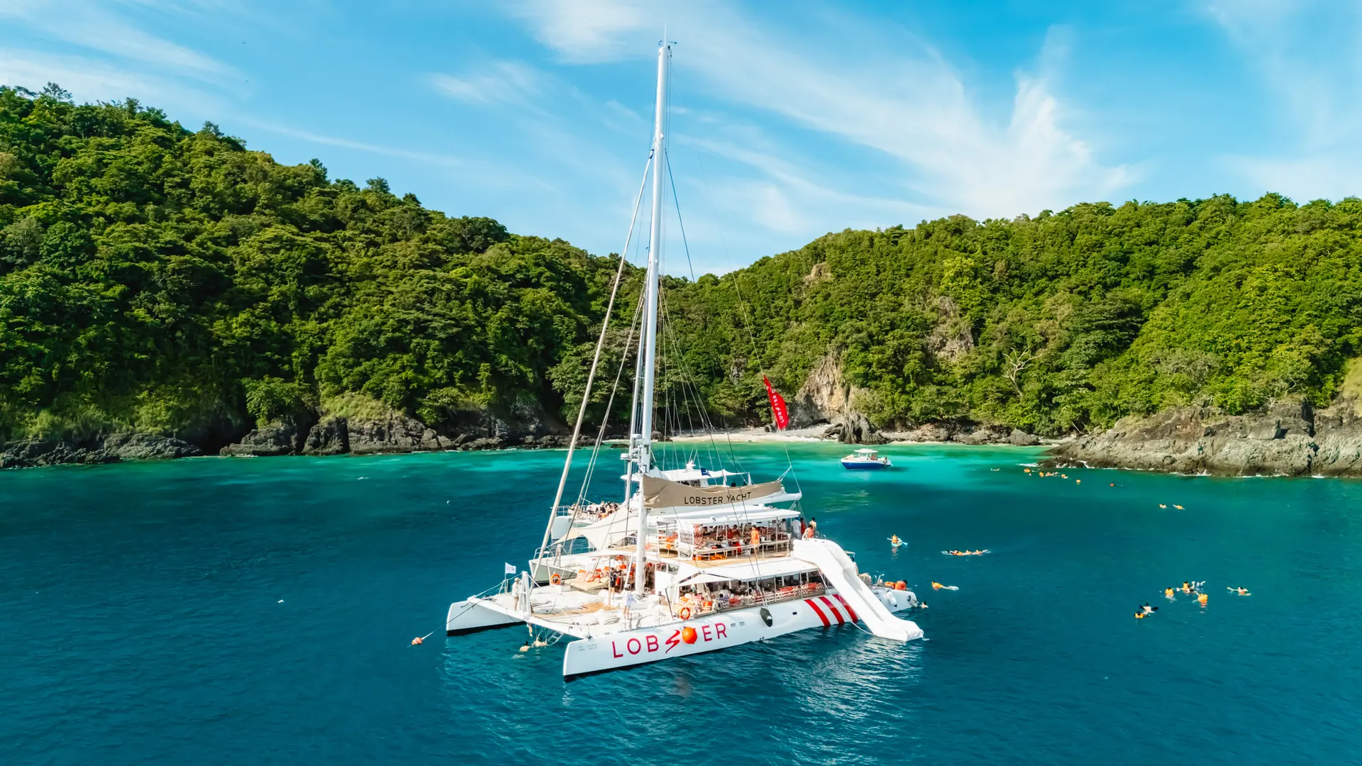 Lobster anchored in a turquoise island bay
