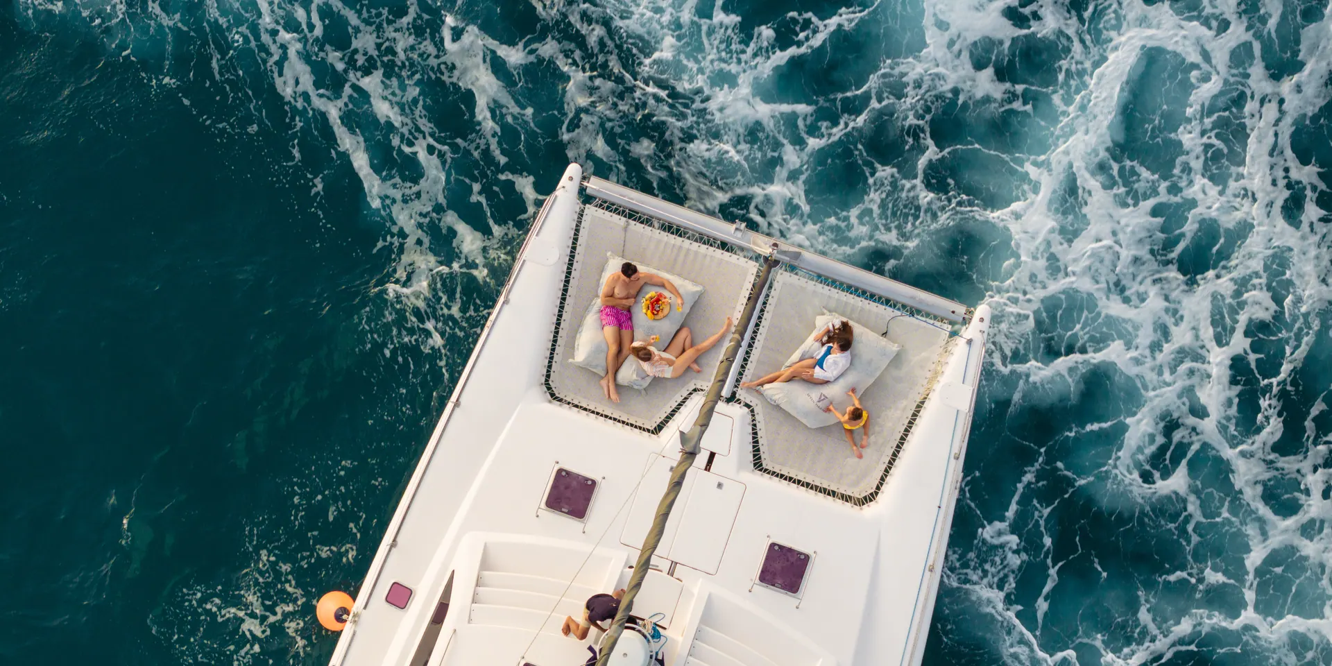 Guests relaxing on SUMMER above the Andaman Sea
